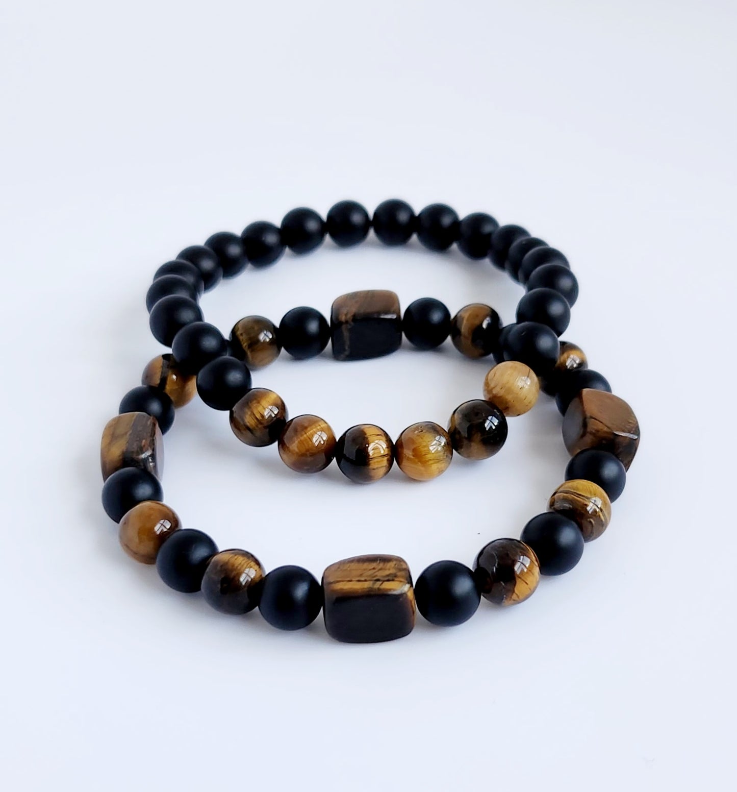 Brown Tiger eye and Matt black.